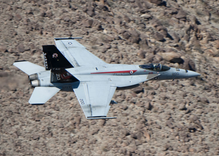 Matt Stoll Flying in a fighter jet across the desert